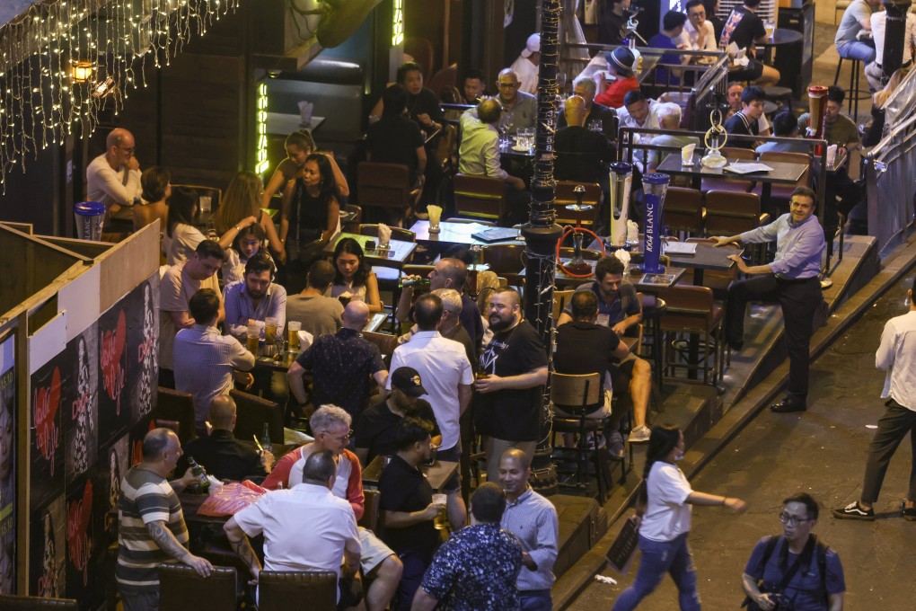 Businesses in Lan Kwai Fong have rolled out festive products to attract customers. Photo: Jonathan Wong