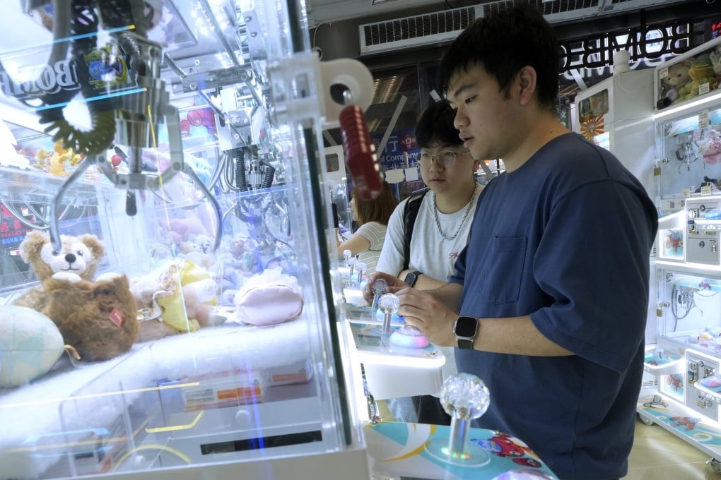 Young residents at a claw machine arcade in Mong Kok. Photo: Sun Yeung