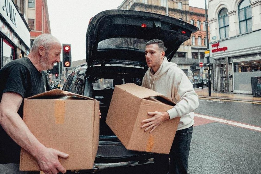 Diogo Dalot with his donations to Lifeshare’s Christmas Project in the Manchester city centre. Photo: Facebook/Fabrizio Romano