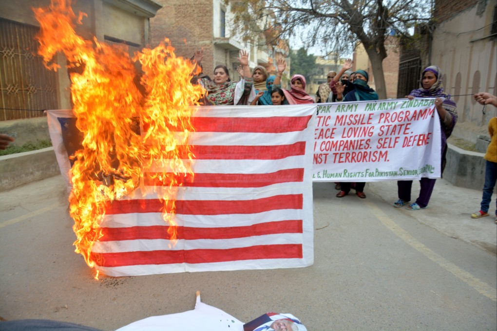 A protest in Multan on Monday against US sanctions on some Pakistani companies allegedly involved in long-range missile technology. Photo: EPA-EFE