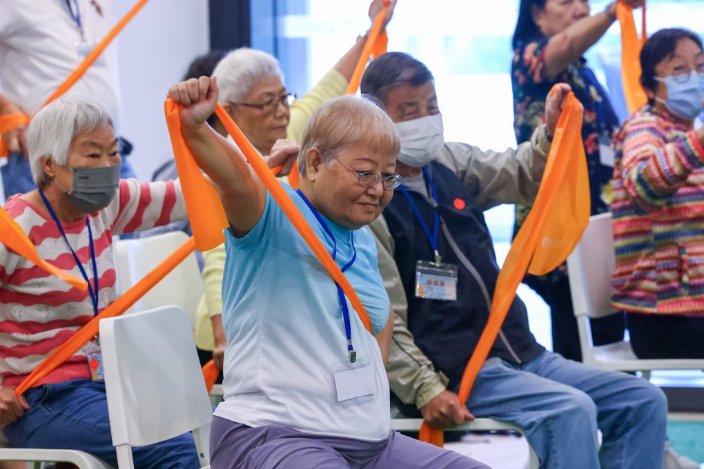 Elderly residents in a stretching group exercise on November 15, 2024. Photo: Dickson Lee
