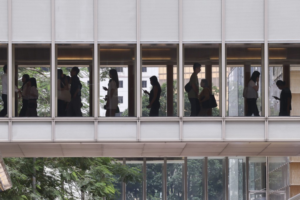 People walked on a footbridge in Central. Photo: Jelly Tse