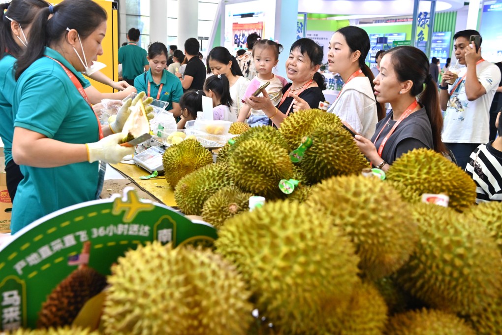 People buy Malaysian durians at the China-Asean Expo in Nanning, Guangxi Zhuang autonomous region, in September. Photo: Xinhua