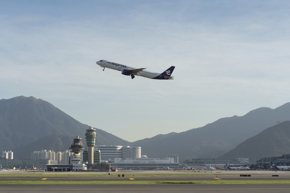 A plane takes off from Hong Kong International Airport on November 27. Airport-related jobs are expected to increase to 123,000 by 2030, to keep up with traffic volume. Photo: AP