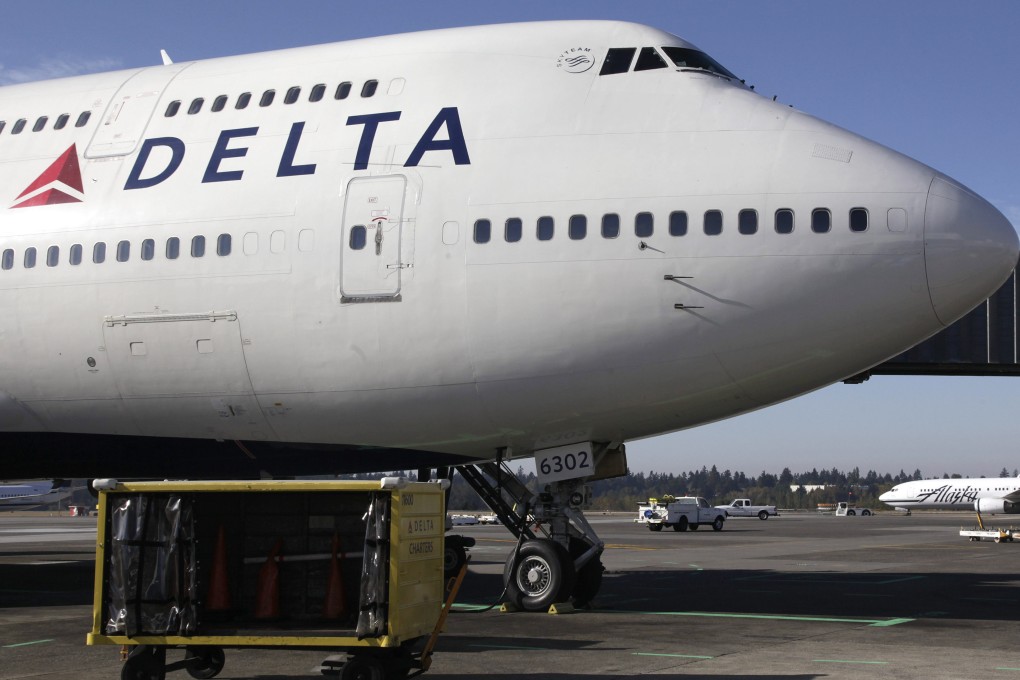 An unticketed passenger was discovered as Delta flight 487 was taxiing to the runway at Seattle-Tacoma International Airport. Photo: ap