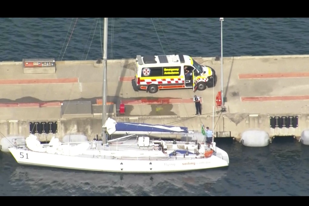 This image made from video provided by several televsion stations shows sailing boat Flying Fish Arctos moored next to an ambulance at Jervis Bay, Australia on Friday. Photo: AP