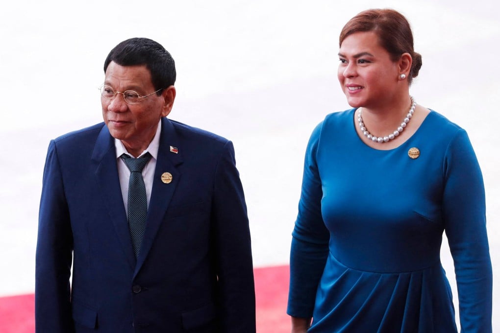 Ex-Philippines President Rodrigo Duterte (left) and his daughter Sara Duterte arrive for the opening of the Boao Forum for Asia on June 19. Photo: AFP