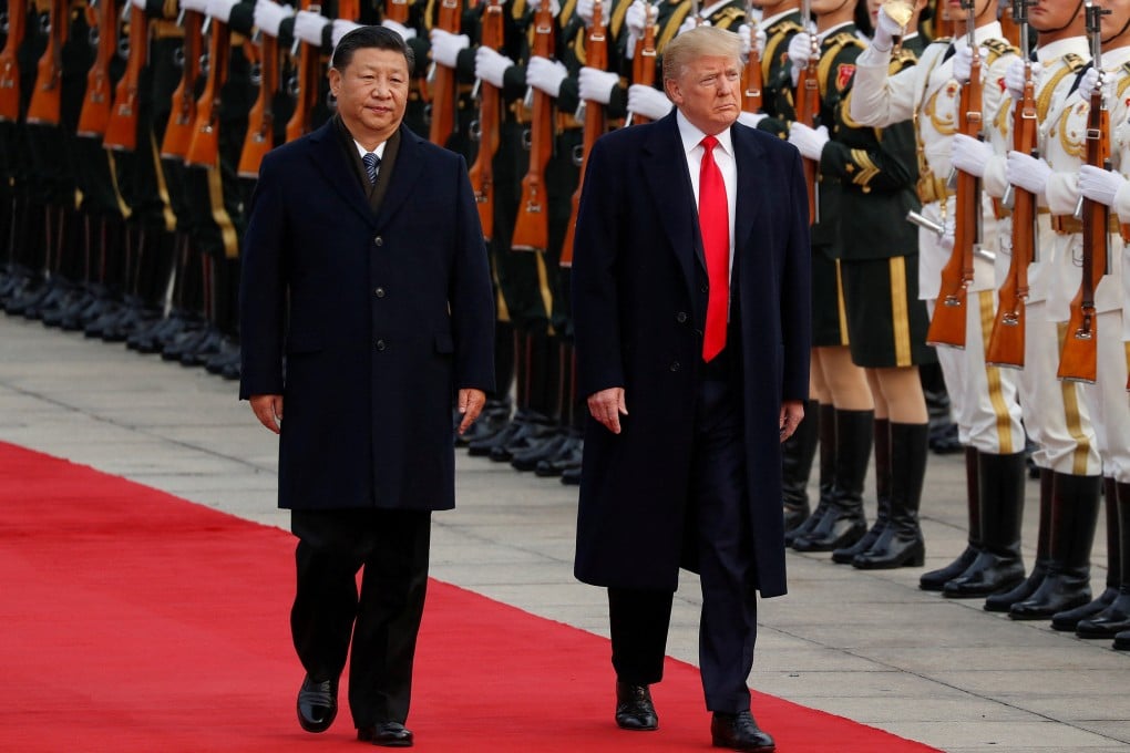 Donald Trump (right), then US president, takes part in a welcoming ceremony with Chinese President Xi Jinping in Beijing on November 9, 2017. Photo: Reuters