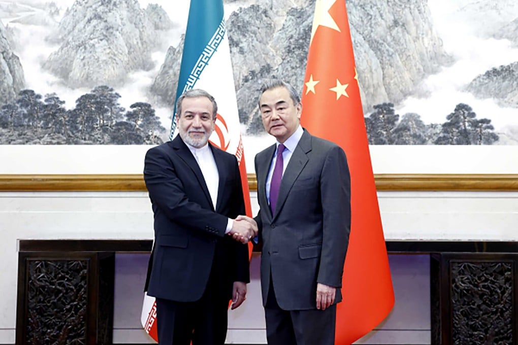 Chinese Foreign Minister Wang Yi (right) meets his Iranian counterpart Abbas Araghchi in Beijing on Saturday. Photo: Chinese Ministry of Foreign Affairs