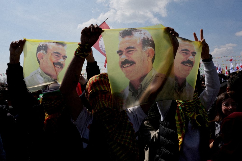 Supporters of the pro-Kurdish Peoples’ Equality and Democracy Party (DEM Party) display flags with a portrait of jailed Kurdistan Workers Party (PKK) leader Abdullah Ocalan, in Istanbul, Turkey, on March 17. Photo: Reuters