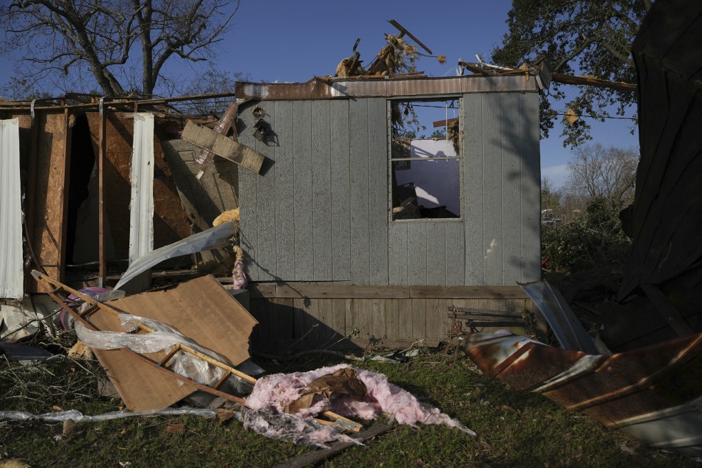 A mobile home sits damaged following a tornado that went through Katy, Texas on Saturday. Photo: AP