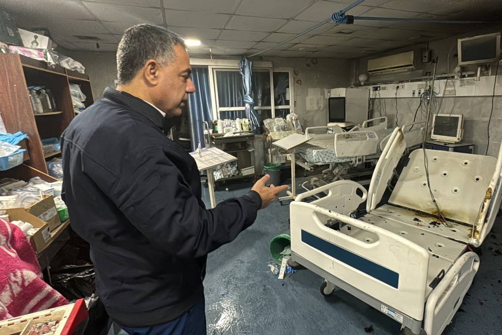 Dr Hussam Abu Safiya, director of Kamal Adwan hospital, shows the damage inside the hospital in Beit Lahiya, northern Gaza on December 18. On Saturday, Gaza’s health ministry said Abu Safiya had been arrested by Israeli soldiers on Friday. Photo: Reuters