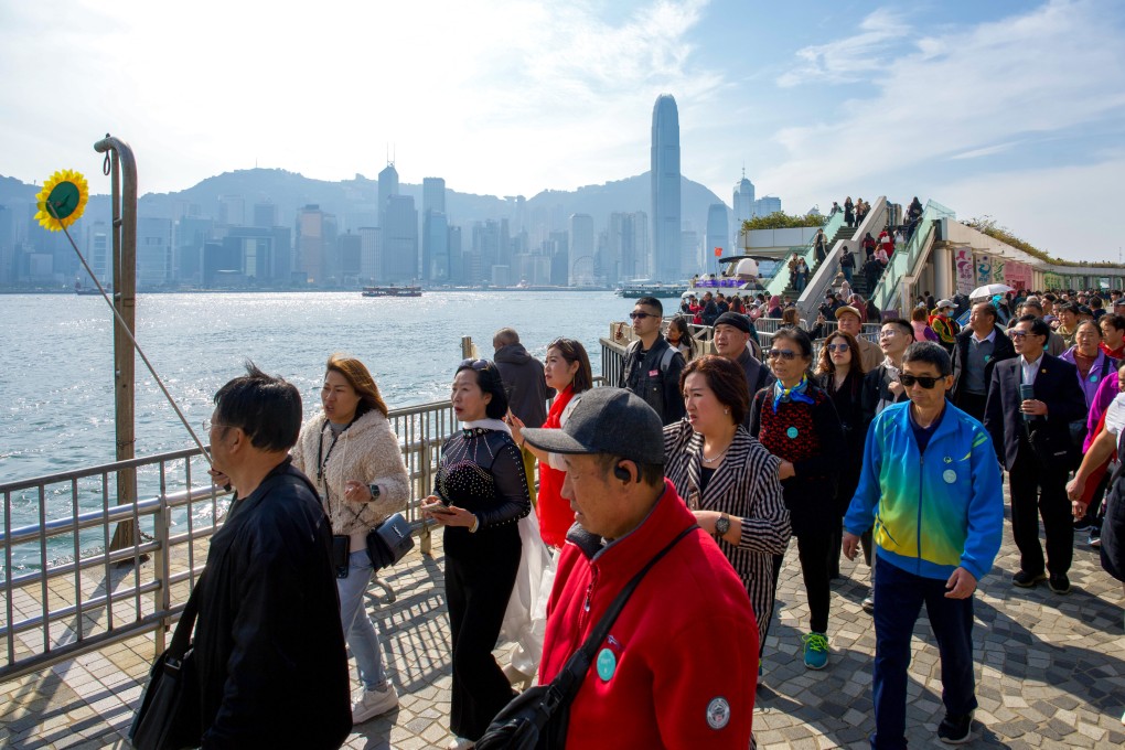 Mainland tourists visit Victoria Harbour in Tsim Sha Tsui. Photo: Sam Tsang