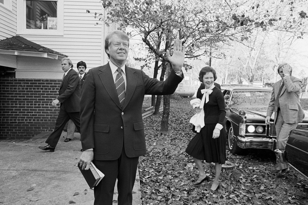 Then-president-elect Jimmy Carter waves to the crowd as he and his wife Rosalynn arrive at the Plains Baptist Church to attend services in Plains, Georgia, in November 1976. Photo: AP