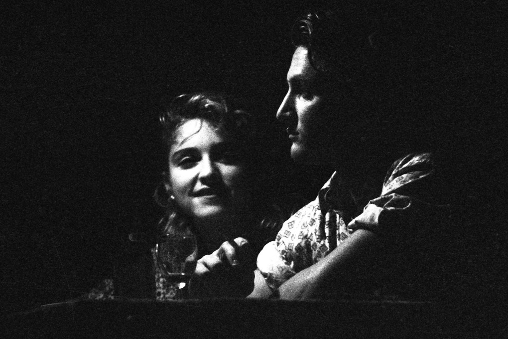 Madonna and her actor husband Sean Penn were snapped by an intrepid Post photographer dining in the Godown restaurant in Central during her trip to Hong Kong in early 1986 to shoot the film Shanghai Surprise. Photo: SCMP Archives
