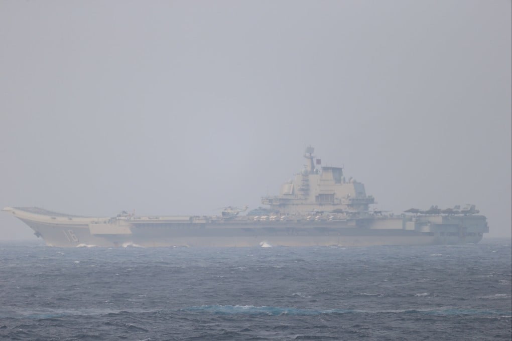 A Chinese aircraft carrier sails through the Miyako Strait near Okinawa on its way to the Pacific in April 2021. Photo: Joint Staff Office of the Defence Ministry of Japan via Reuters