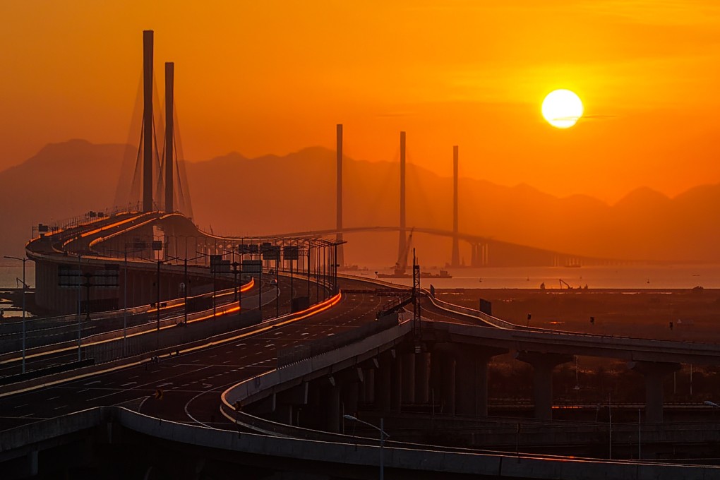 Huangmaohai Bridge, with its three striking towers, is seen in the rear-centre of this photo taken from Guangdong province; Gaolan Port Bridge (with two towers) is seen to the left. Photo: Xinhua