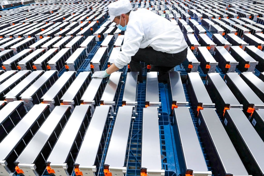 A worker at a car battery plant in Nanjing, China. Photo: AFP