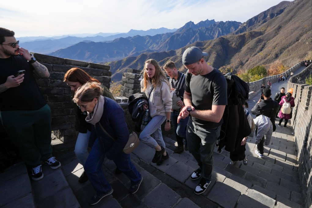 With the steady expansion of China’s visa-free entry policy, an influx of foreign tourists is expected during the coming Lunar New Year holiday. Photo: Xinhua