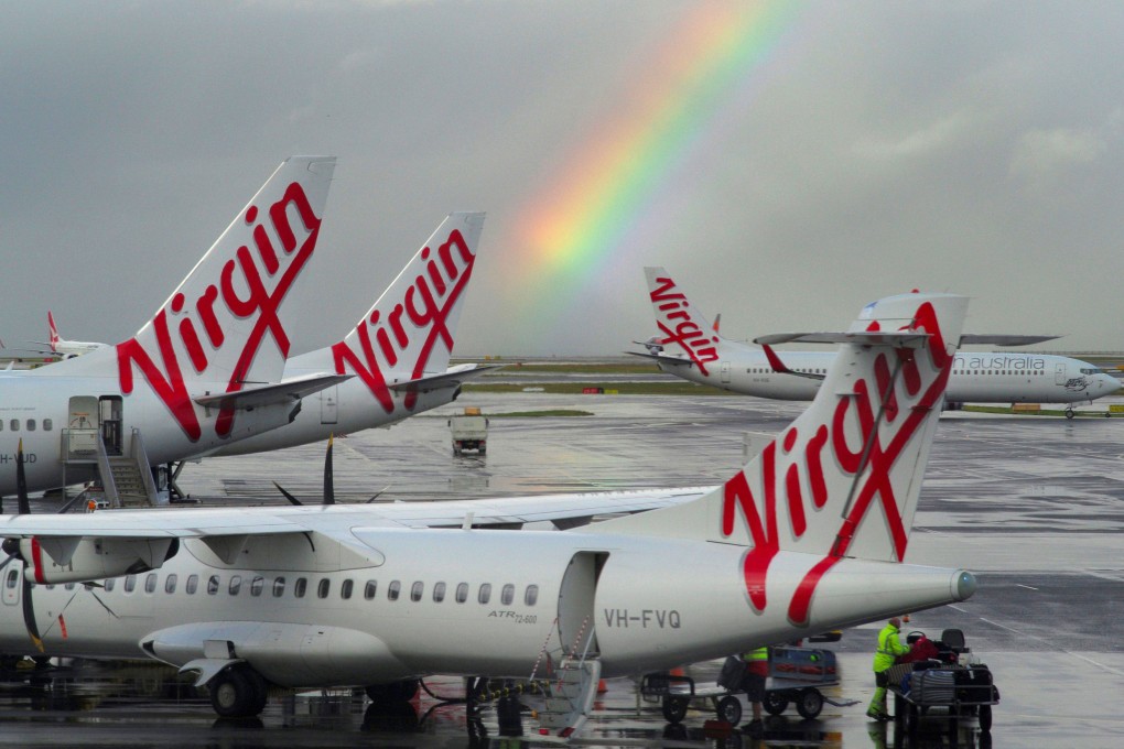 Virgin Australia planes parked at Sydney airport. Photo: Reuters