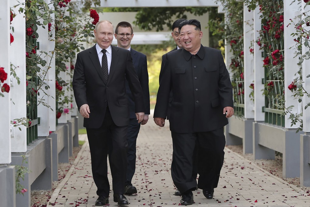 North Korean leader Kim Jong-un (right) and Russia’s President Vladimir Putin, walk through a garden of the Kumsusan State Guest House in Pyongyang, North Korea on June 19, 2024. Photo: KCNA/KNS via AP