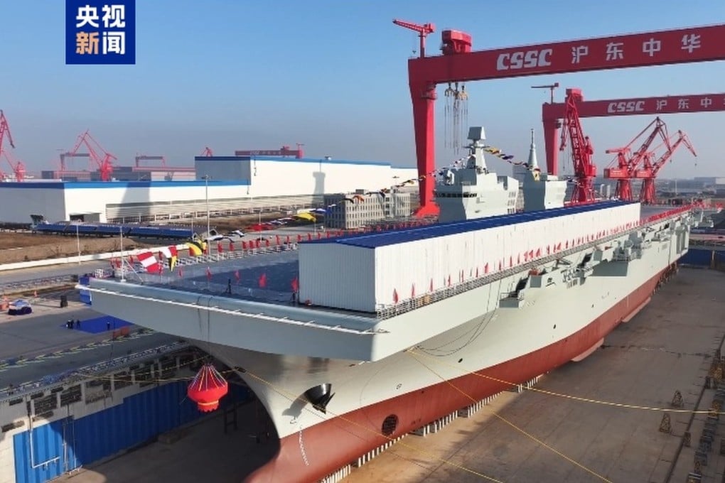 China’s first Type 076 amphibious assault ship makes its debut on Friday. Photo: CCTV