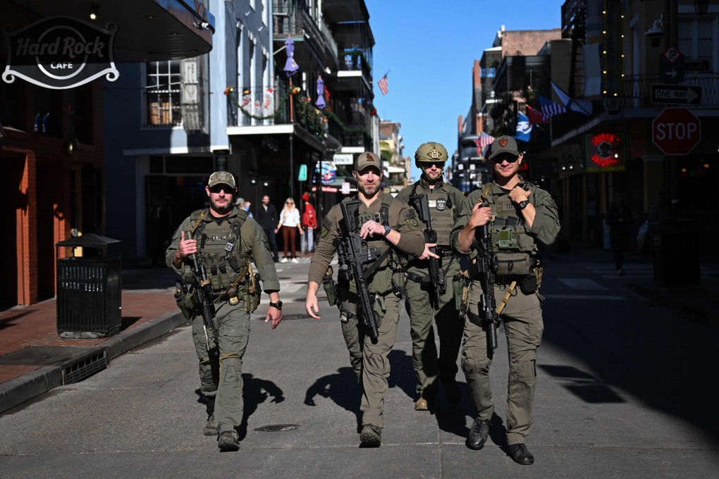 Federal agents walk along Bourbon Street after it reopened to the public following the truck attack. Photo: AFP