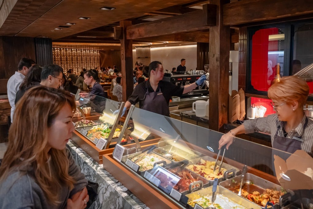 Customers line up at a two-dish rice counter in a shopping mall in Central district on November 22. Photo: Alexander Mak