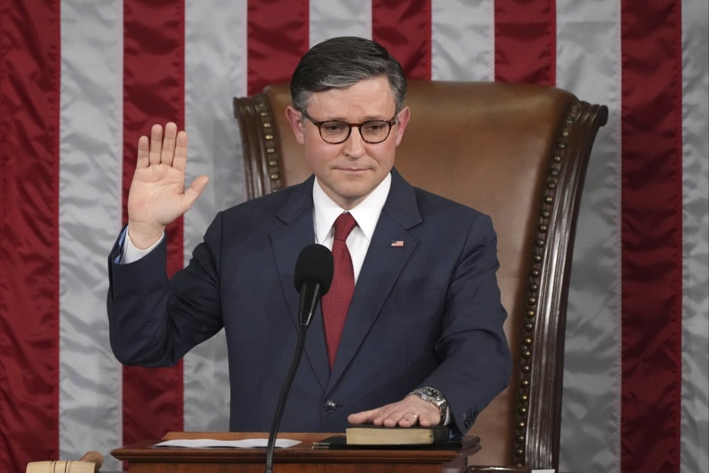 House Speaker Mike Johnson takes the oath of office after being re-elected at the Capitol in Washington on Friday. Photo: AP