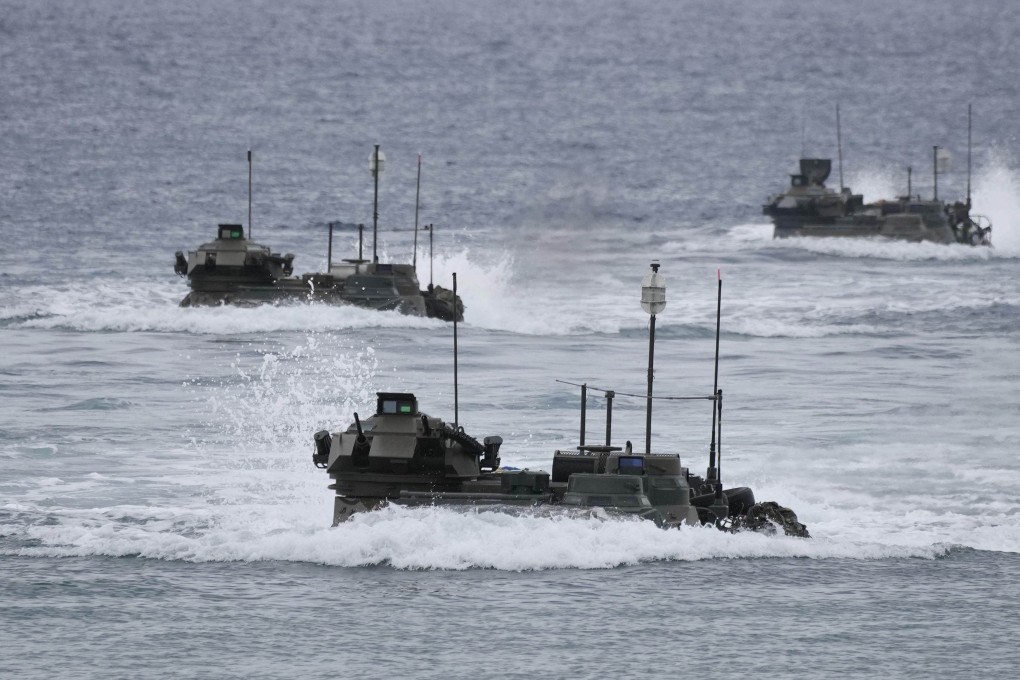 Japanese military vessels sail towards the country’s southwest in November 2023, for drills on an island seen as vulnerable to China in case of a conflict. Photo: Kyodo