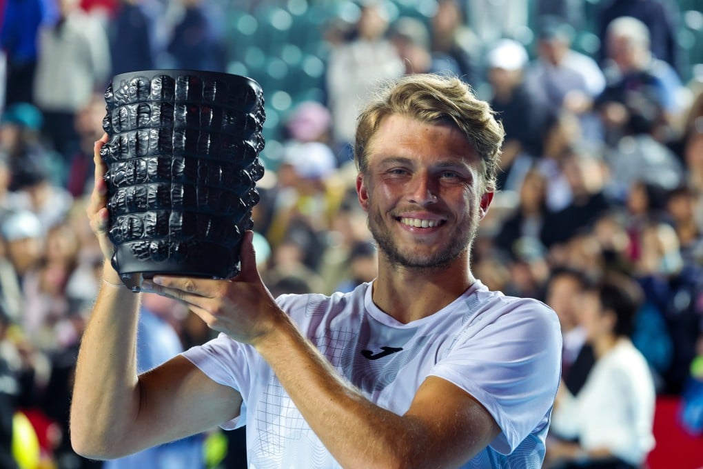 Alexandre Muller holds the trophy after winning the Bank of China Hong Kong Tennis Open at Victoria Park. Photo: Dickson Lee