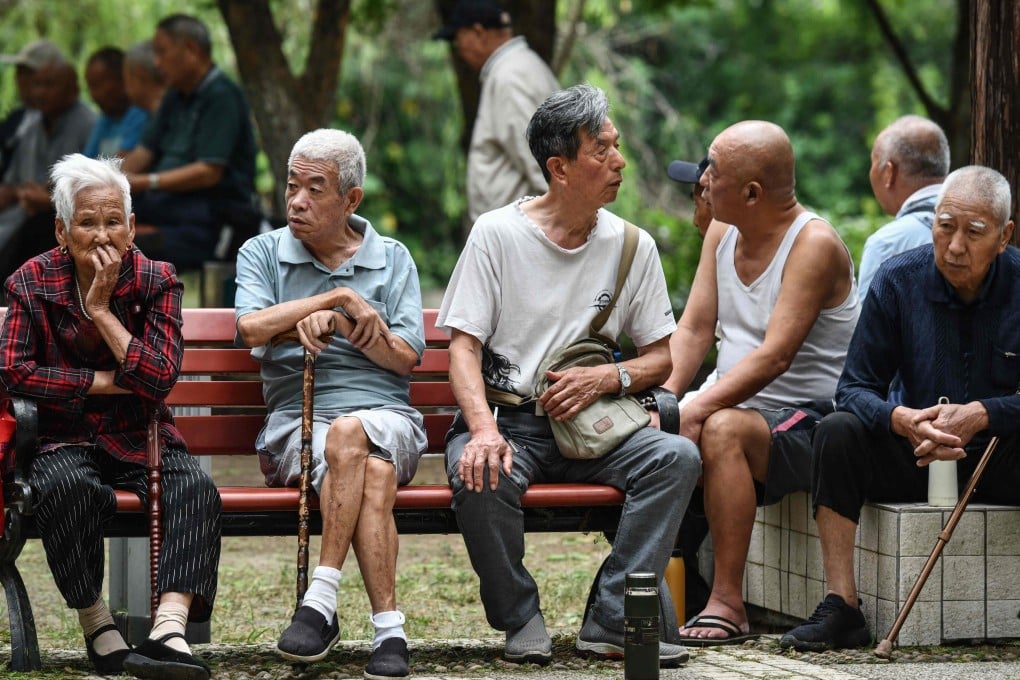 Elderly people rest at a park in Fuyang, eastern China’s Anhui province. Photo: AFP