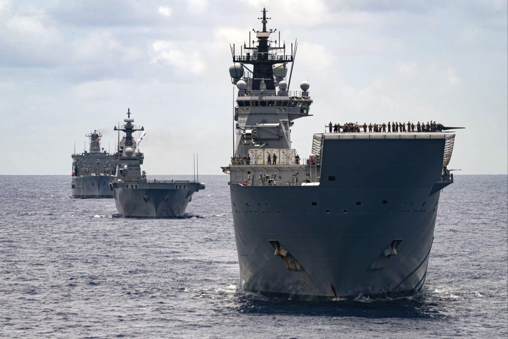 Royal Australian Navy ships Canberra, Supply and Warramunga sail in formation with 37 ships during the Rim of the Pacific exercise in 2022. Photo: Australian Defence Force via AP
