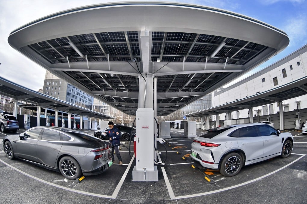 EVs sit at a charging station in Beijing on December 26, 2024. Photo: Xinhua