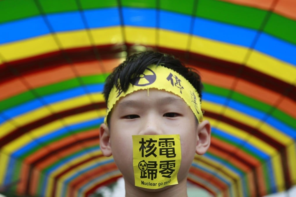 A boy at an anti-nuclear demonstration in Taipei on April 26, 2014. The sticker reads “Nuclear go zero”. Taiwan turned against nuclear as far back as 2011 in the wake of Japan’s Fukushima disaster. Photo: Reuters