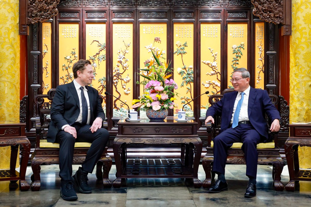 Premier Li Qiang (right) held talks with Tesla CEO Elon Musk in Beijing in April. Photo: Xinhua