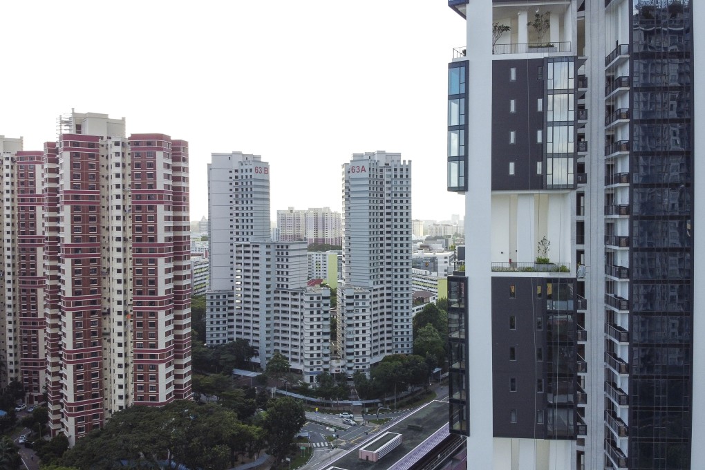 Public housings under the Housing and Development Board (left) and private residential buildings (right) under construction in Singapore in 2020. Photo: Roy Issa