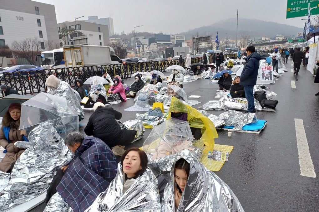 Pro-impeachment protesters camp out near Yoon Suk-yeol’s residence in Seoul, South Korea, on Monday. Photo: Park Chan-kyong