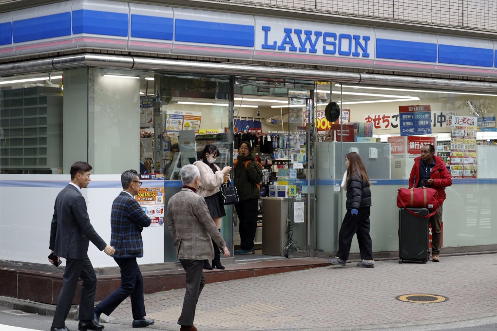 People walk past a Lawson convenience store in Tokyo. Photo: EPA-EFE