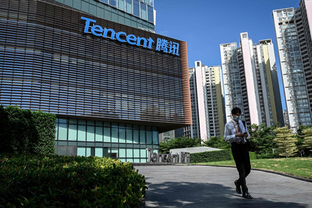 A man walks past the Tencent headquarters in Shenzhen, China. Photo: AFP