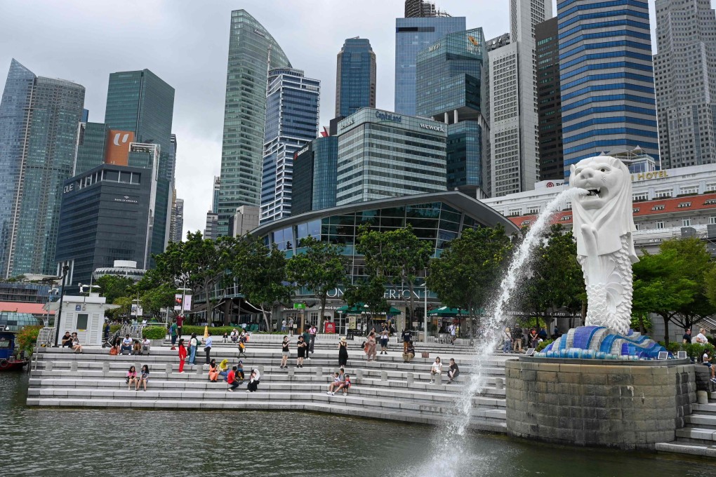Singapore’s new law empowers police to freeze bank accounts of scam victims to prevent further losses. Photo: AFP