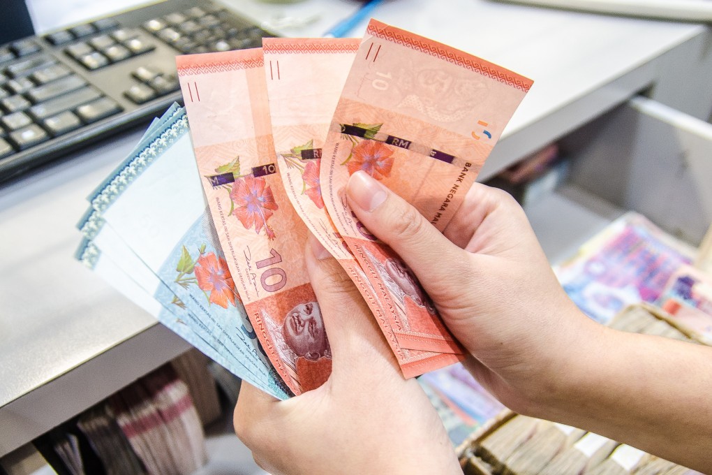 Malaysian ringgit banknotes. Malaysia will also provide a special income tax rate of 15 per cent for 10 years for eligible knowledge workers in the zone. Photo: Shutterstock