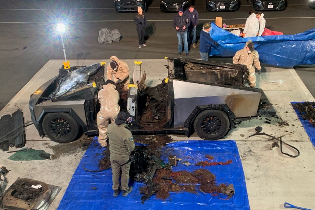 Investigators inspect a damaged Tesla Cybertruck on January 2 after it exploded in front of the Trump International Hotel in Las Vegas, Nevada. Photo: Las Vegas Metropolitan Police Department via Reuters
