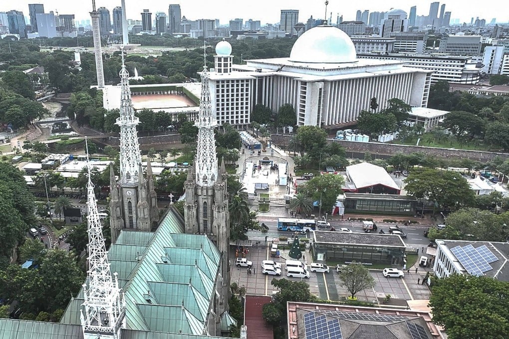 The Istiqlal Mosque (top) and the Cathedral of Saint Mary of the Assumption (bottom). Indonesia officially recognises six religions. Photo: Indonesia’s Presidential Palace / AFP