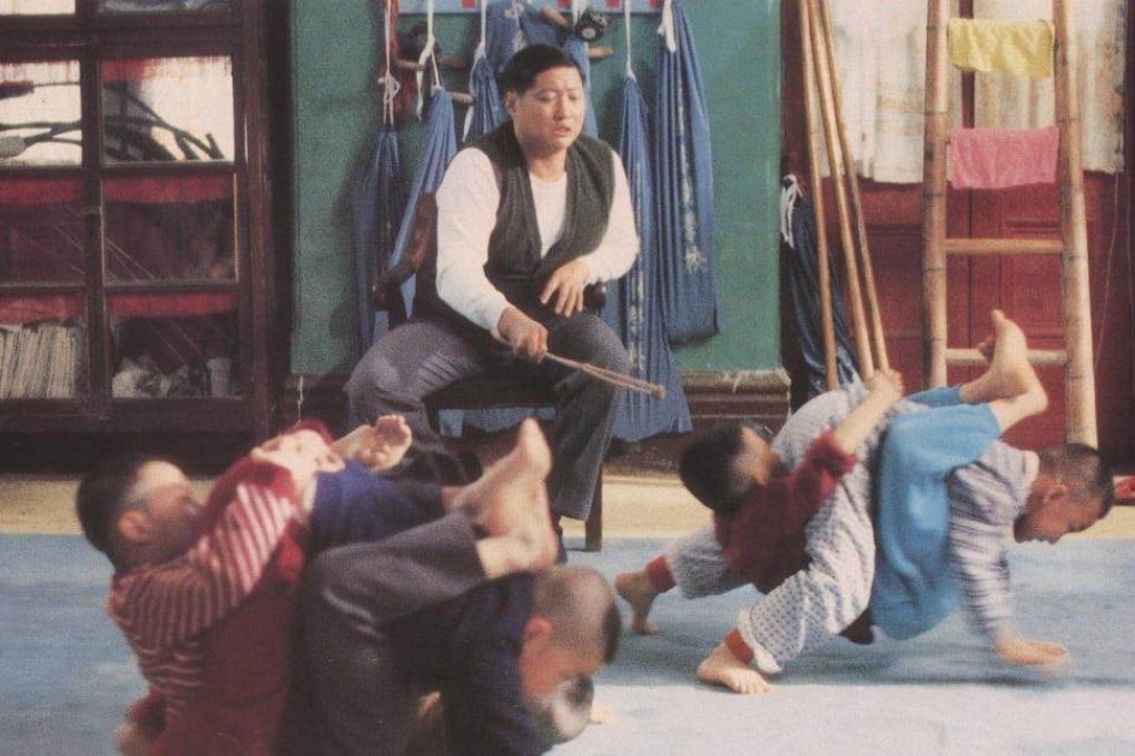 Sammo Hung (seated) plays his mentor, Peking opera master Yu Jim-yuen, in a still from the 1988 film Painted Faces. Photo: Golden Harvest