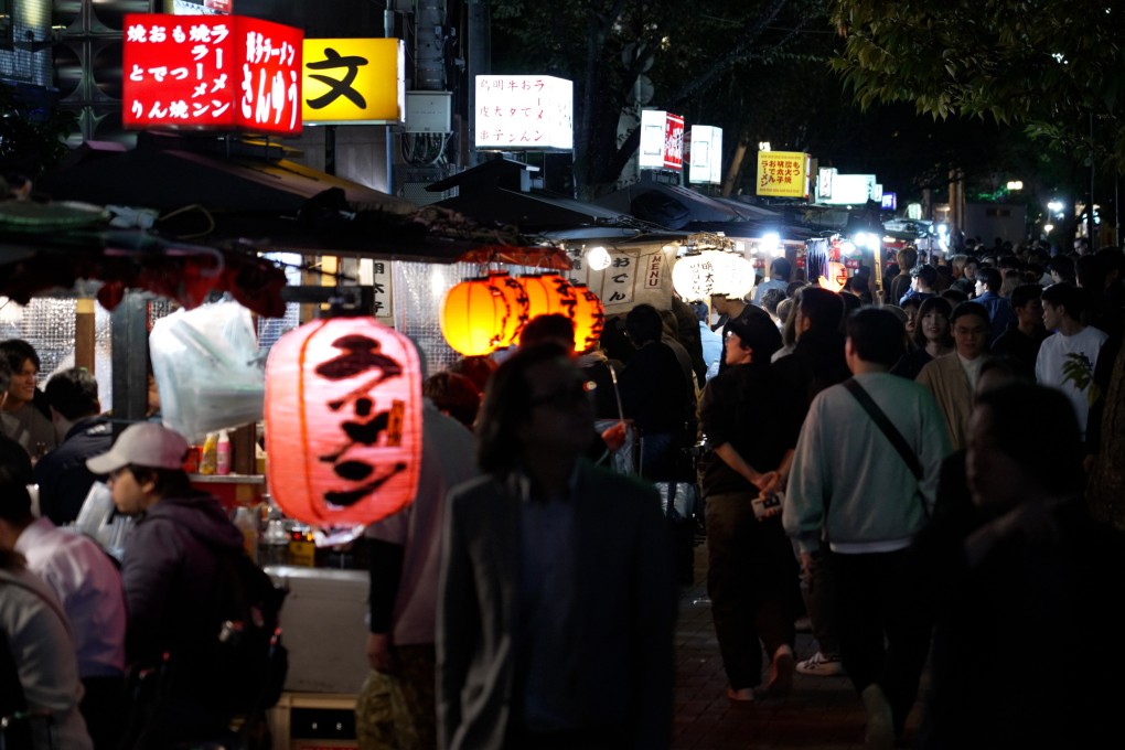 Fukuoka’s open-air food stalls come alive at night, offering local delicacies and a fun atmosphere. Photo: Llewellyn Cheung