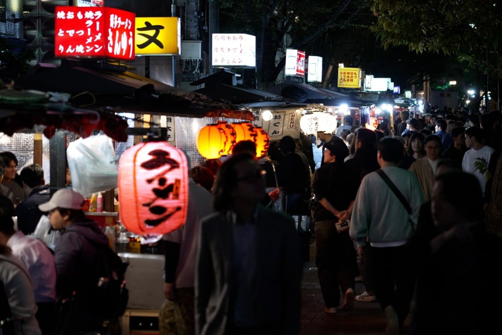 Fukuoka’s open-air food stalls come alive at night, offering local delicacies and a fun atmosphere. Photo: Llewellyn Cheung