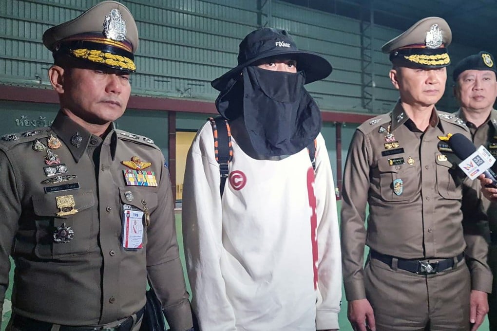 A handout photo from the Royal Thai Police shows Chinese actor Wang Xing being escorted by officers after returning from Myanmar, at the police airport in Bangkok, Thailand, on Tuesday. Photo: EPA-EFE