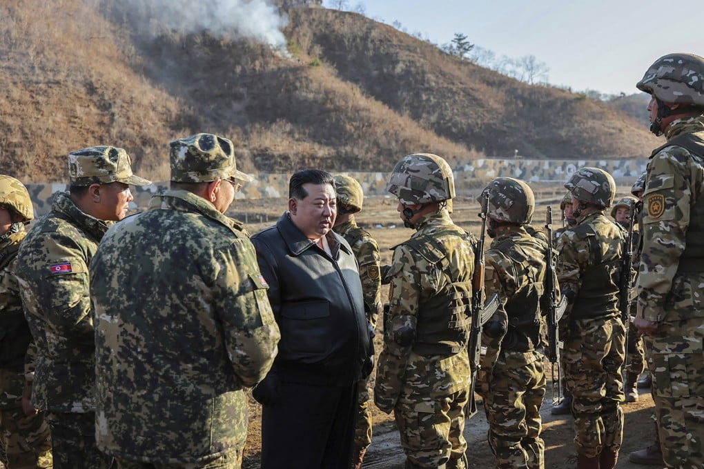 North Korean leader Kim Jong-un meets soldiers during a visit to a training base in North Korea in March 2024. Photo: KCNA via AP