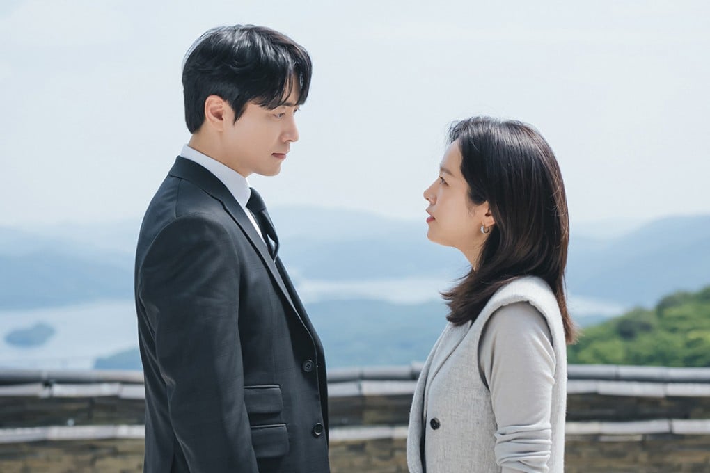 Lee Joon-hyuk (left) as secretary Eun-ho and Han Ji-min as headhunter Ji-yoon in a still from Love Scout, a frothy and fun Korean romcom.